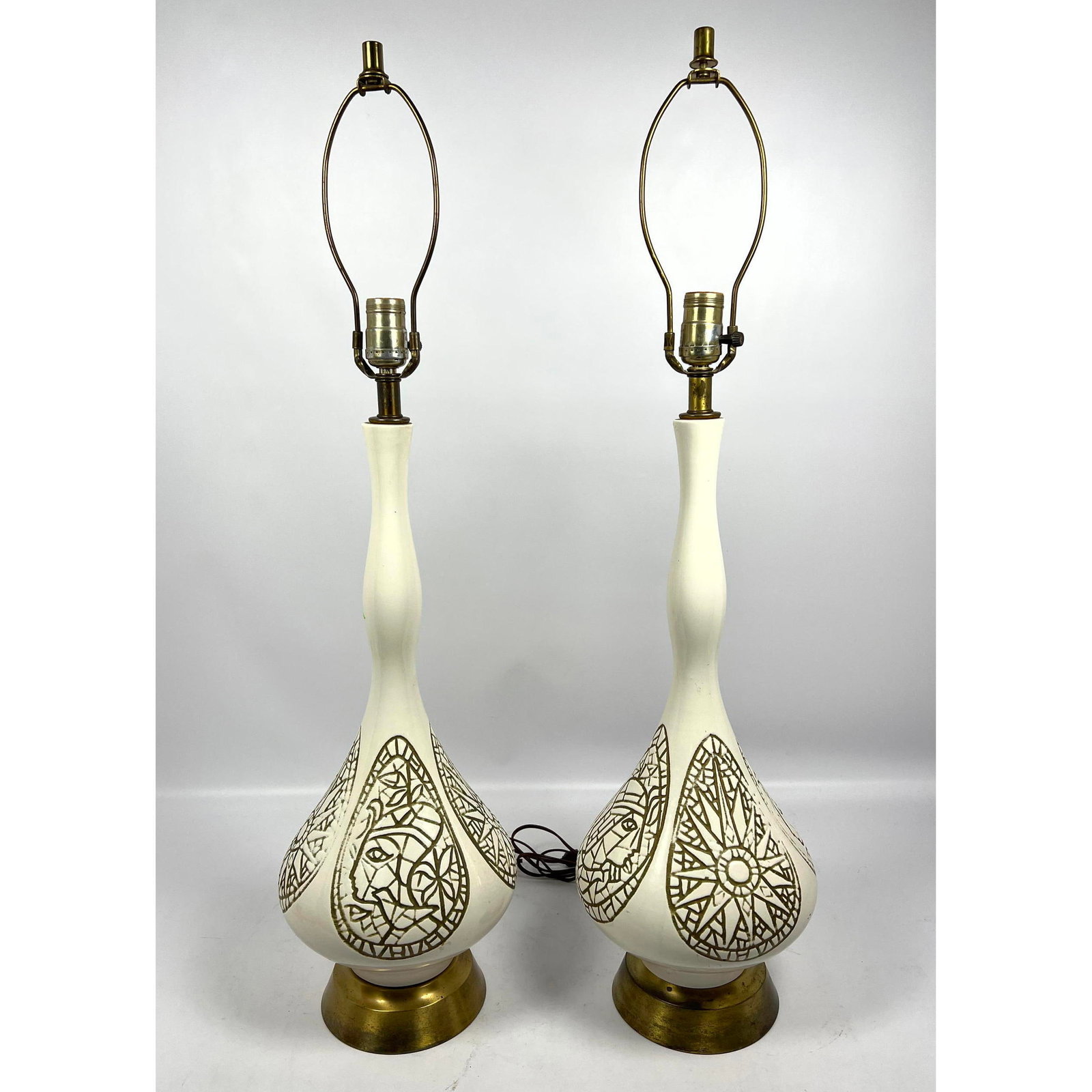 Mid Century Tear Drop Style Lamps. with Etched Abstract Patterns Ceramic material: Mid Century Tear Drop Style Lamps. with Etched Abstract Patterns Ceramic material Dimensions: Height: 34 inches, Width: 9 inches, Depth: 9 inches. --- - - We offer curbside delivery to NYC, Manhattan,