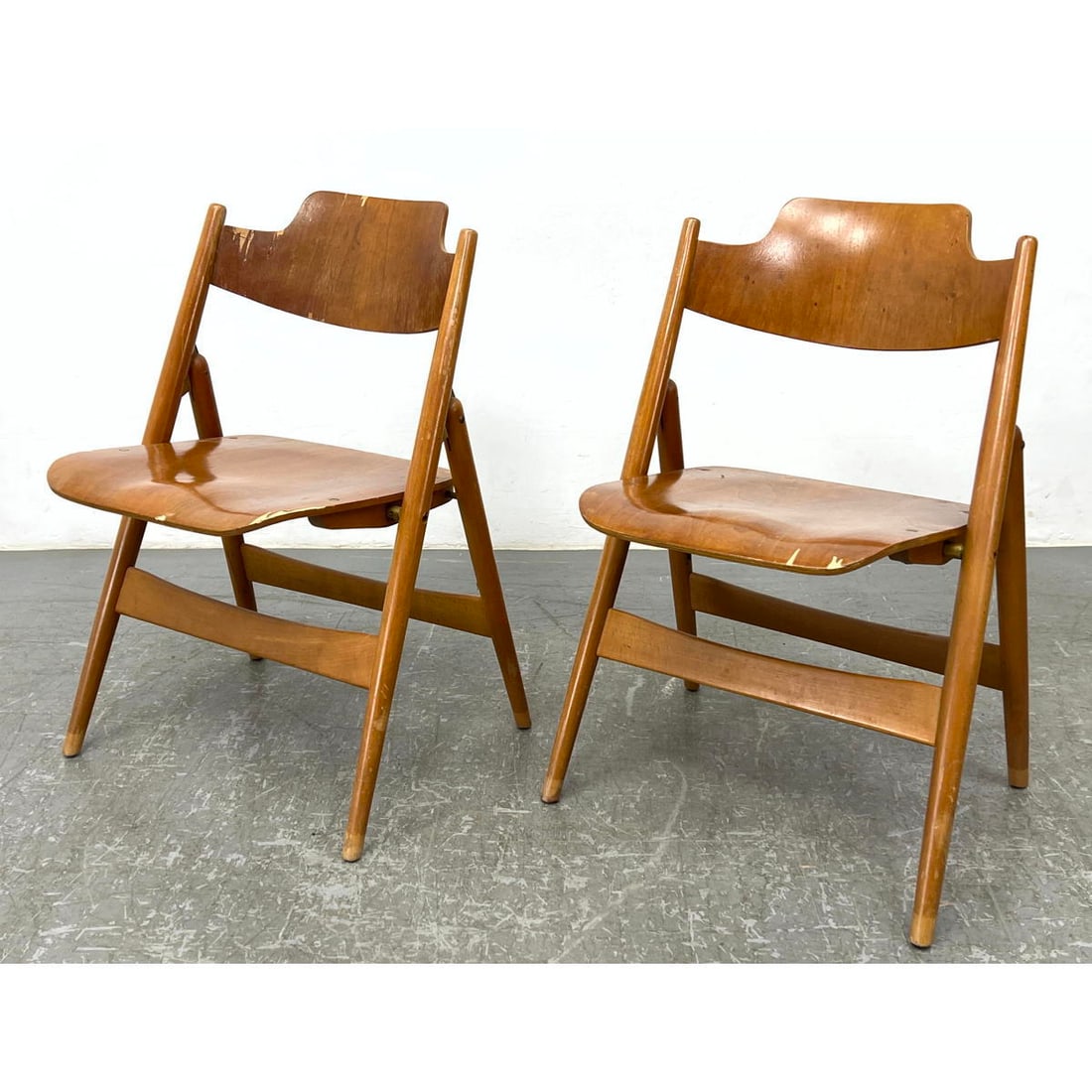 Pair folding chairs signed JG. Egon Eiermann designed.: Pair folding chairs signed JG. Egon Eiermann designed. Dimensions: Height: 29.5 inches, Width: 20 inches, Depth: 19 inches. - Seat Height: 18 inches --- - - We offer curbside delivery to NYC, Manhatta
