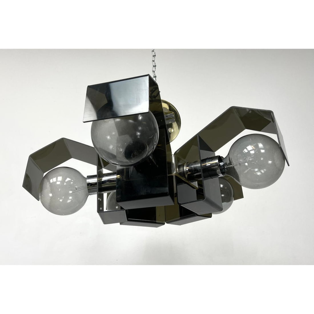 Smoked lucite modernist hanging chandelier. 5 large glass bulbs. Untested: Smoked lucite modernist hanging chandelier. 5 large glass bulbs. Untested Dimensions: Height: 8 inches, Width: 25 inches, Depth: 25 inches. --- - - We offer curbside delivery to NYC, Manhattan, Close