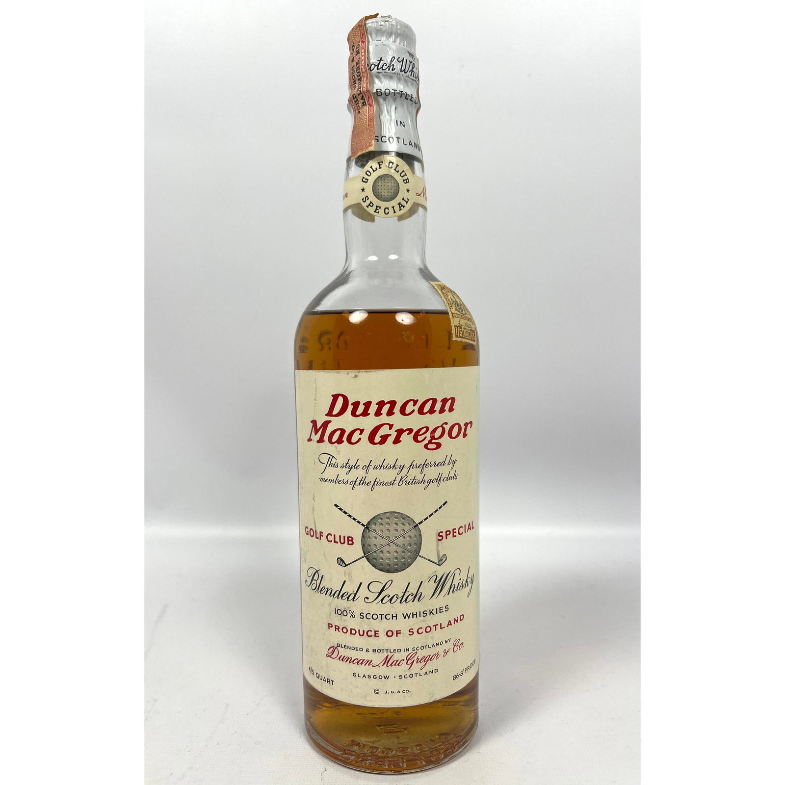 Duncan Mac Gregor Blended Scotch Whiskey. Sealed. Golf Club Special.: Duncan Mac Gregor Blended Scotch Whiskey. Sealed. Golf Club Special. Dimensions: Height: 12 inches, Width: 3 inches, Depth: 3 inches. --- US Packing and Shipping charge: In house shipping available. W
