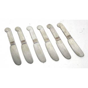 Set of 6 Luc Lanel Butter knives designed for Christofle: Set of 6 Luc Lanel Butter knives designed for Christofle Dimensions: Height: 3.75 inches, Width: inches. --- US Packing and Shipping charge: $20 Plus insurance at a rate of $1 per hundred.