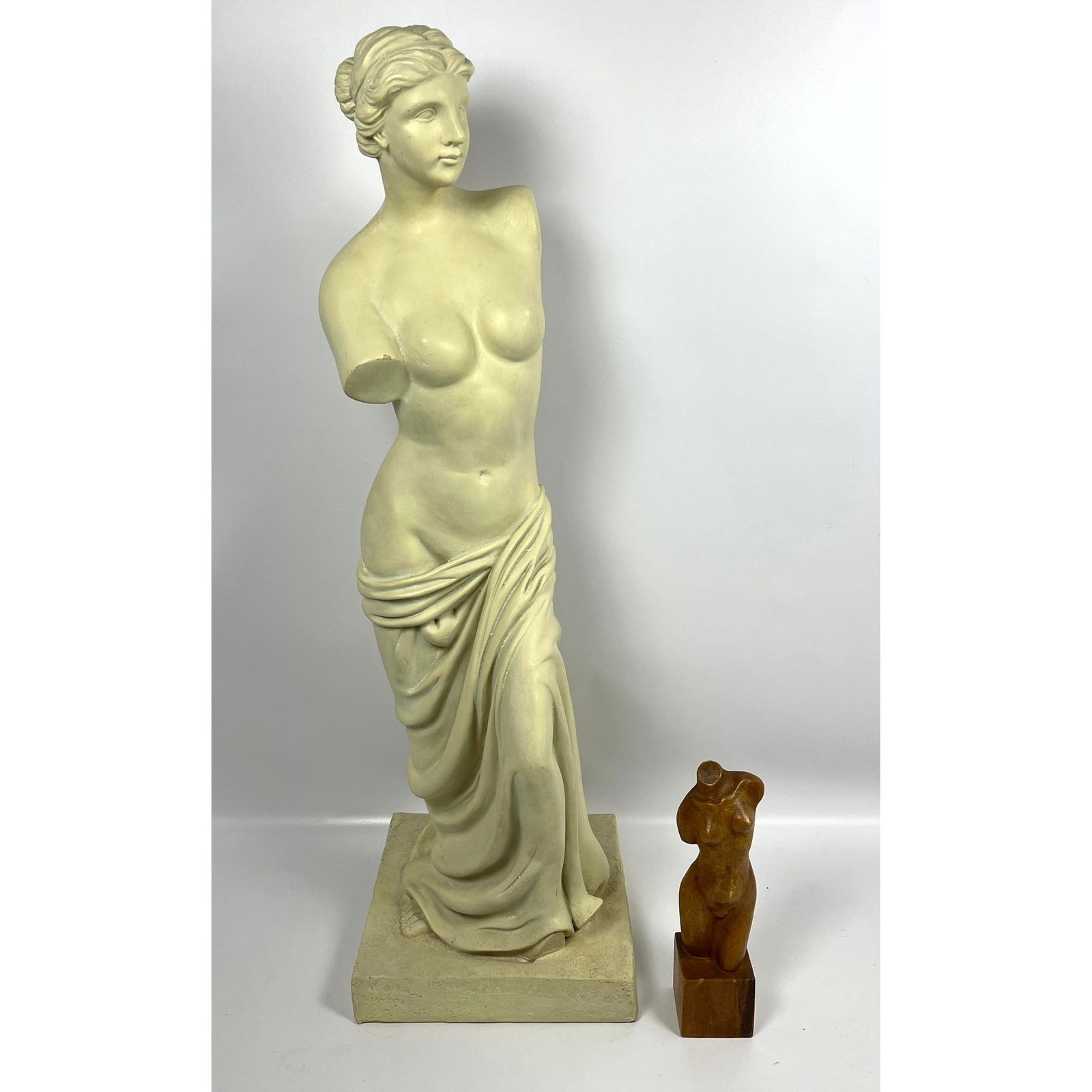 2 nude Sculptures. Plastic Venus de Milo Garden and Carved Wood Female Torso Sculpture: 2 nude Sculptures. Plastic Venus de Milo Garden and Carved Wood Female Torso Sculpture Dimensions: Height: 30.5 inches, Width: 9.25 inches, Depth: 9.25 inches. - Additional Dimensions: Smaller H: 9.25
