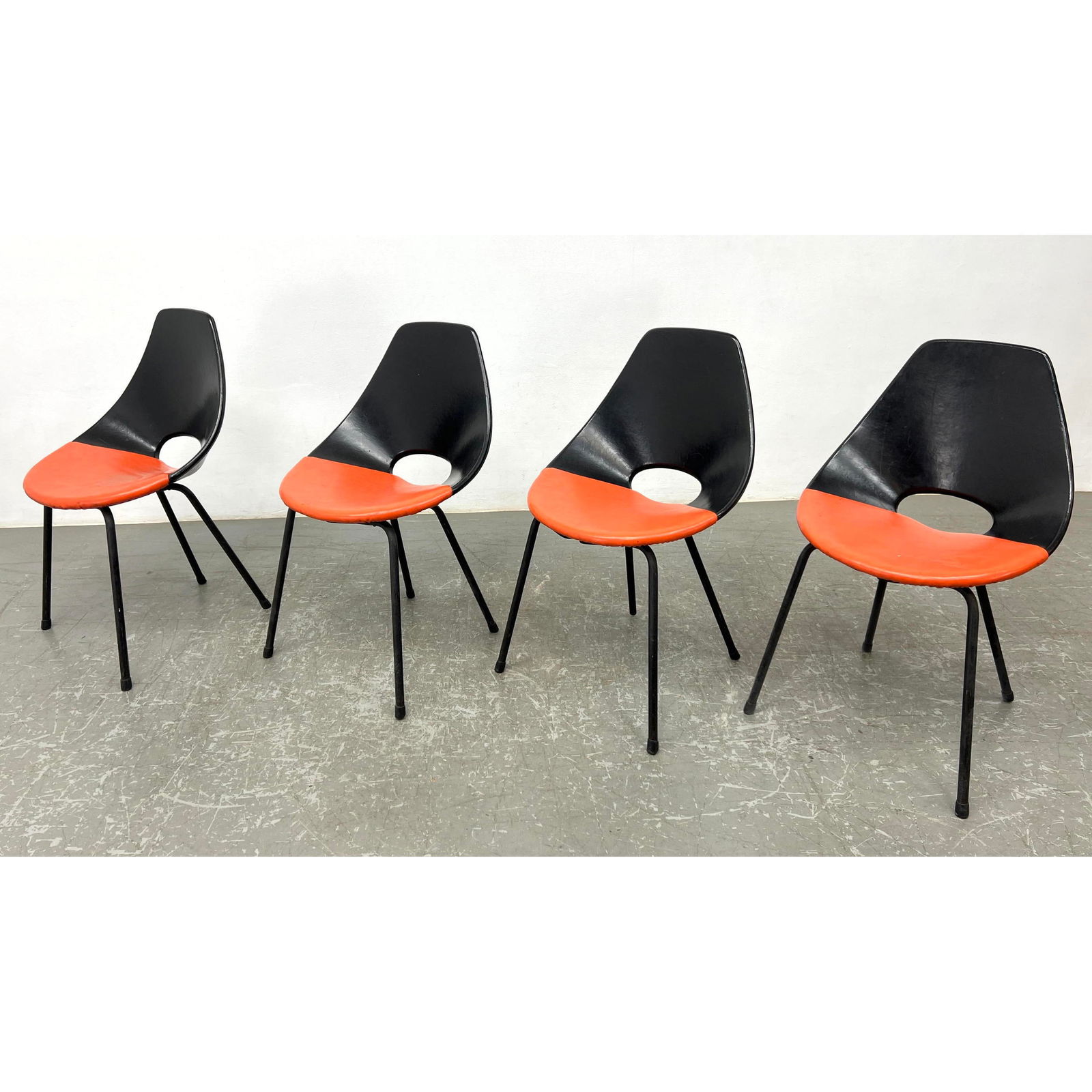 Set 4 dining chairs in the style of Pierre Guariche, France, ca. 1960s. Black and orange Vinyl. (1 of 9)