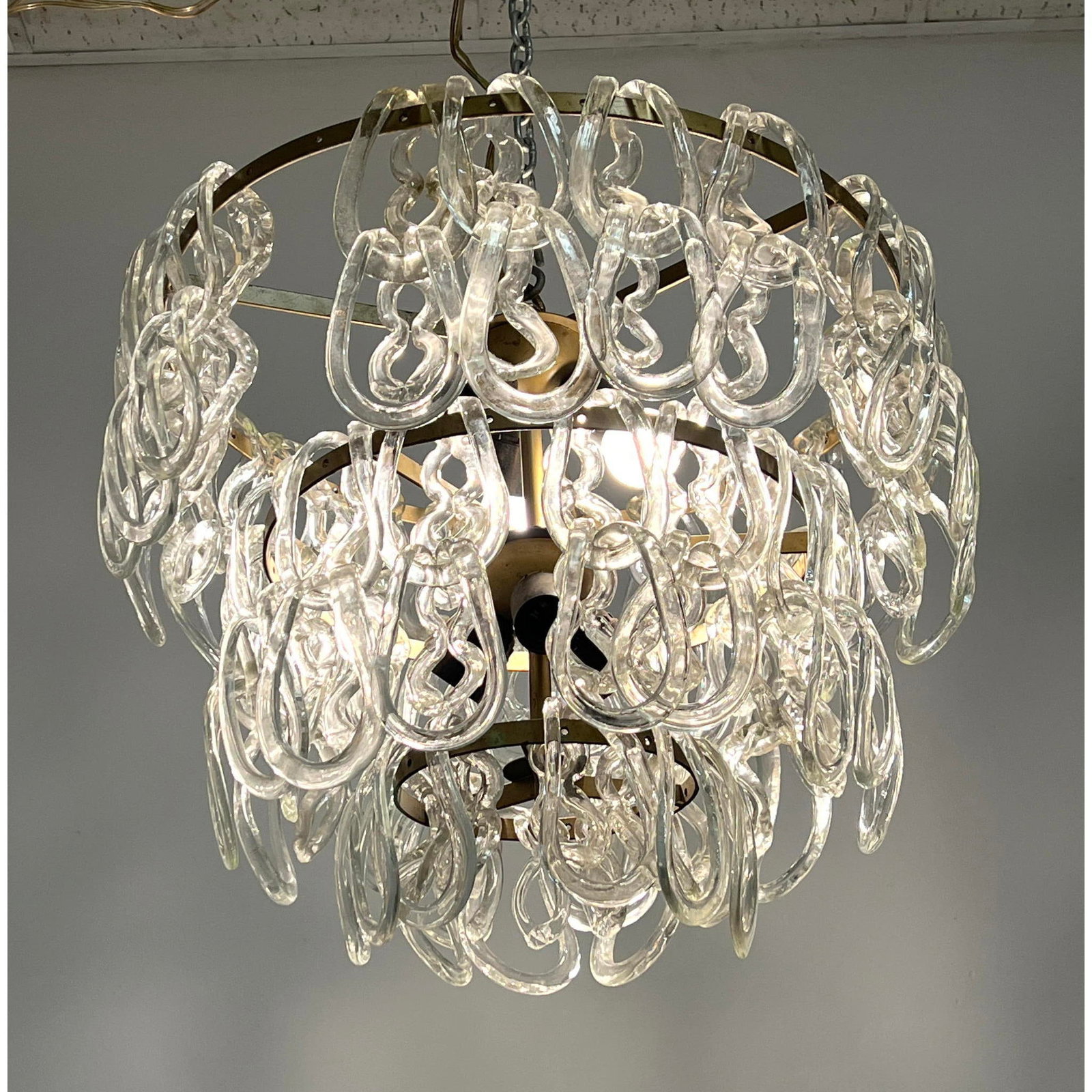 Vistosi style Multi Tier Chandelier. Sculptural glass prism elements.: Vistosi style Multi Tier Chandelier. Sculptural glass prism elements. Dimensions: Height: 17.5 inches, Width: 20 inches, Depth: 20 inches. --- - - We offer curbside delivery to NYC, Manhattan, Close B