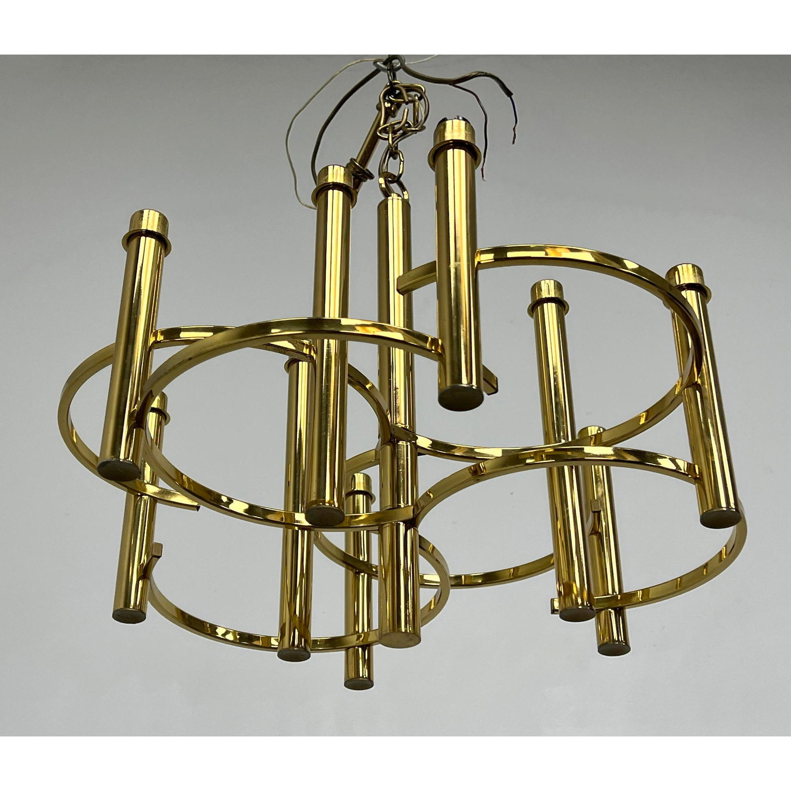 Modernist Sciolari Brass Chandelier. Round hoop forms support tube uprights.: Modernist Sciolari Brass Chandelier. Round hoop forms support tube uprights. Dimensions: Height: 16 inches, Width: 20 inches, Depth: 20 inches. --- - - We offer curbside delivery to NYC, Manhattan, Cl