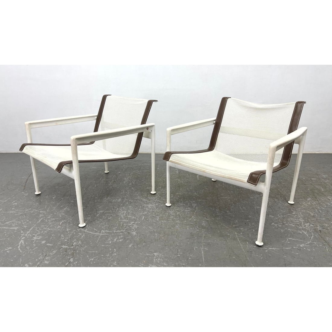 Pr RICHARD SCHULTZ Outdoor Lounge Chairs. White metal frames with white mesh sling seats.: Pr RICHARD SCHULTZ Outdoor Lounge Chairs. White metal frames with white mesh sling seats. Dimensions: Height: 25.25 inches, Width: 26 inches, Depth: 27 inches. - Seat Height: 14.75 inches --- - - We o