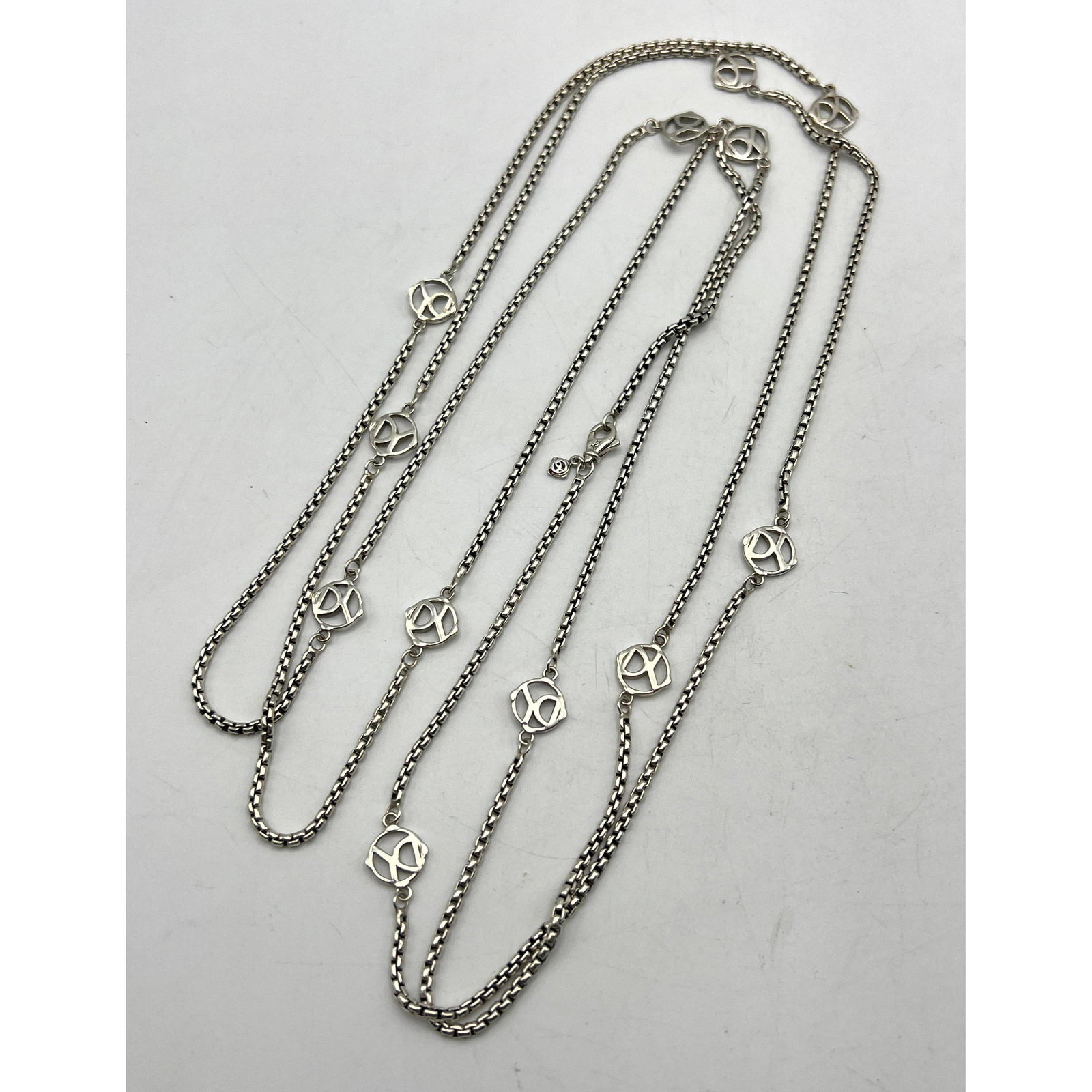 DAVID YURMAN Sterling Silver Logo Necklace. 73" Opera Length. Marked DY 925.: DAVID YURMAN Sterling Silver Logo Necklace. 73" Opera Length. Marked DY 925. Dimensions: Height: inches, Width: .5 inches. : L: 73 inches. Weight: 2.09 Troy ozs. --- US Packing and Shipping charge: $2