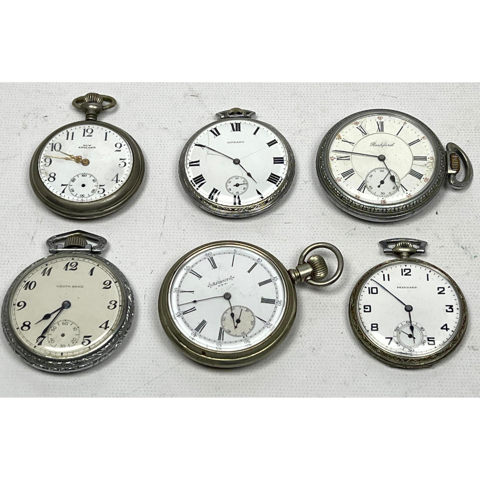Lot 6 Pocket Watches. New England, Howard, Rockford, Standard, South Bend, Reliance with clear back. (1 of 19)
