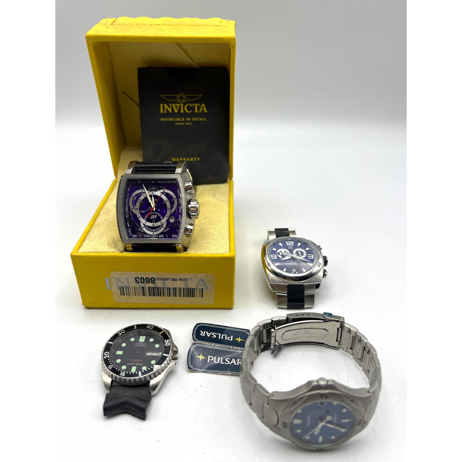 4 Wrist Watches. Invicta, ESQ, Pulsar, Citizen.: 4 Wrist Watches. Invicta, ESQ, Pulsar, Citizen. --- US Packing and Shipping charge: $35 Plus insurance at a rate of $1 per hundred.