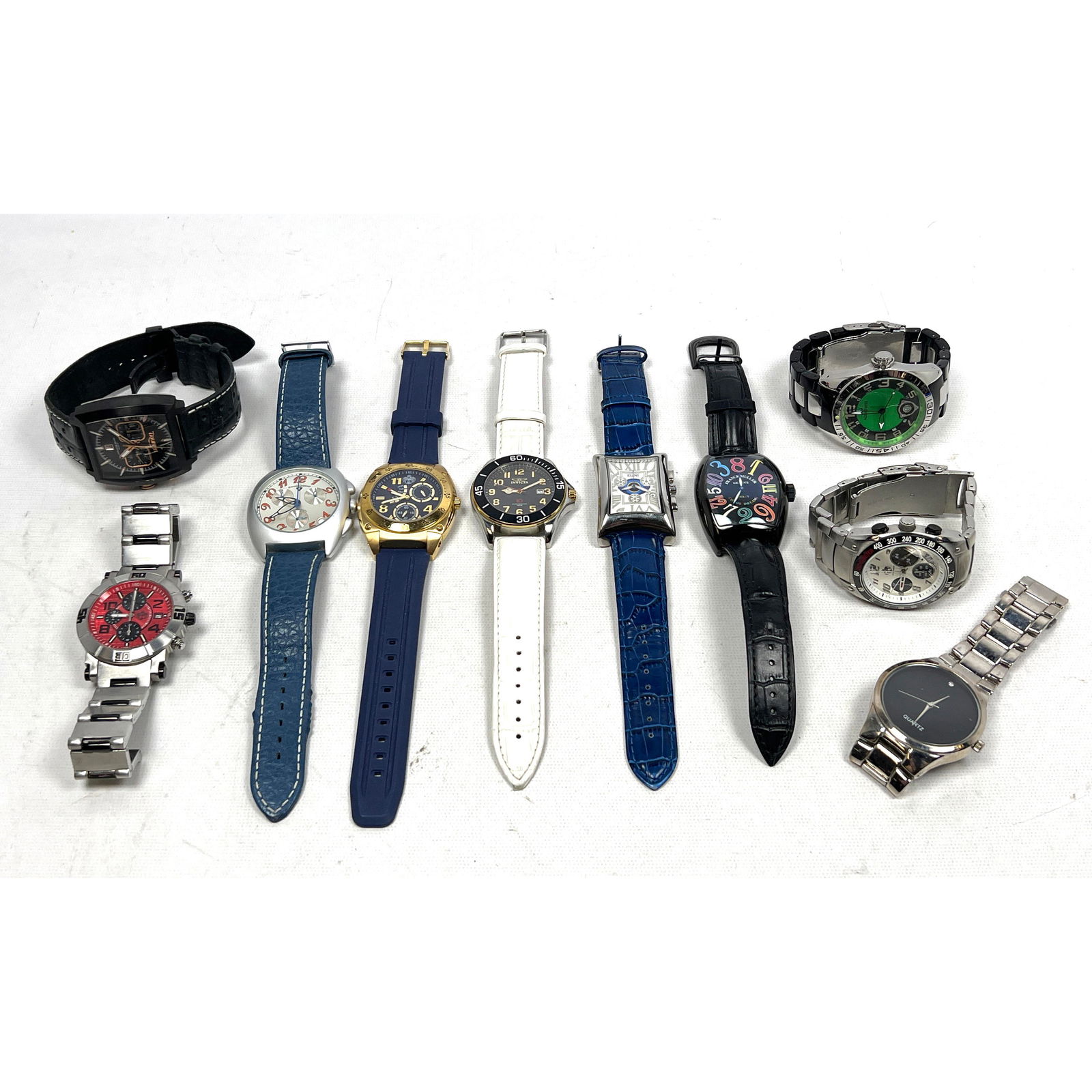 10 pcs Wrist watches. Trax, Aquaswiss, SUG, Triumph, Invicta, etc.: 10 pcs Wrist watches. Trax, Aquaswiss, SUG, Triumph, Invicta, etc. --- US Packing and Shipping charge: $35 Plus insurance at a rate of $1 per hundred.