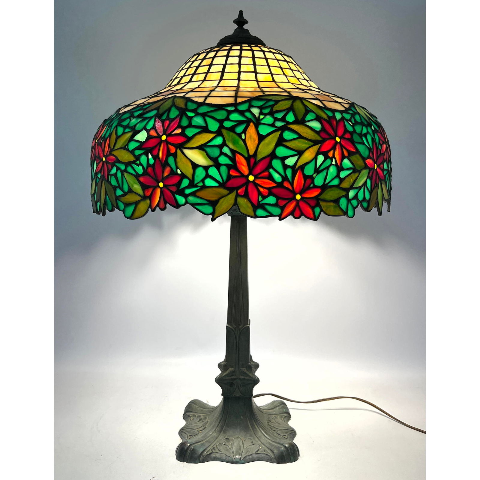 Handel Leaded Glass Poinsettia Table Lamp. Shade marked, base unmarked. Wrong decorative cap. (1 of 16)