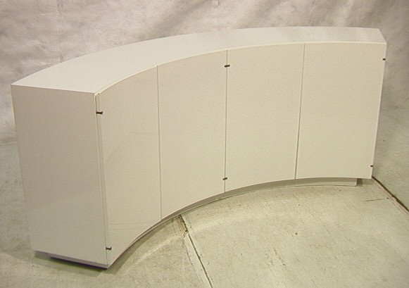 TOMMI PARZINGER Style Curved Concave Sideboard Cr: TOMMI PARZINGER Style Curved Concave Sideboard Credenza. White lacquer finish. Four doors with interior drawers. Finished back. Cabinet sits on base.-- Dimensions: H: 33.5 inches: W: 85 inches: D: 16 