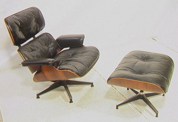 Early Vintage Herman Miller Rosewood Lounge Chair: Early Vintage Herman Miller Rosewood Lounge Chair & Ottoman. EAMES CHARLES & RAY. #670 & #671. Black leather on rosewood frame. -- Dimensions: H: 32.25 inches: W: 33 inches: D: 33 inches ---