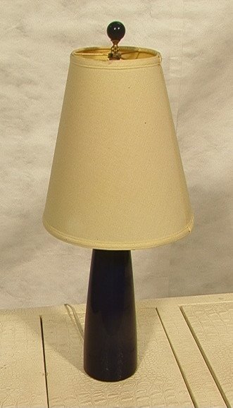 Blue Glazed BOSTLUND Industries Lamp. Pottery lam: Blue Glazed BOSTLUND Industries Lamp. Pottery lamp with cobalt blue glaze. Paper label. Canada.-- Dimensions: H: 29 inches: W: 11 inches: D: 11 inches ---