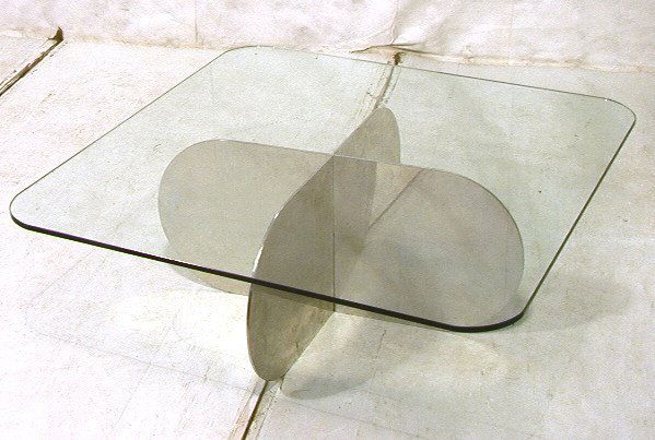 Aluminum & Glass Top Propeller Cocktail Coffee Ta: Aluminum & Glass Top Propeller Cocktail Coffee Table. Square glass top with rounded corners.-- Dimensions: H: 15.5 inches: W: 42 inches: D: 42 inches ---