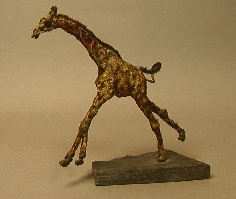 WILLIAM ALLEN Metal Giraffe Sculpture. Mixed meta: WILLIAM ALLEN Metal Giraffe Sculpture. Mixed metal copper & brass. Mounted on slate slab. Slate marked with initials: WMA. Philadelphia area artist.-- Dimensions: H: 9.5 inches: W: 3.5 inches ---