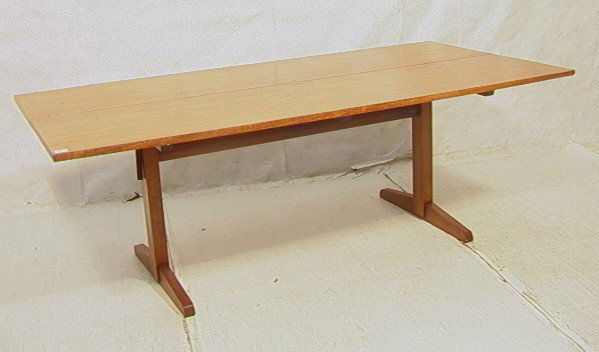 1956 7" Walnut GEORGE NAKASHIMA Dining Table. Two: 1956 7" Walnut GEORGE NAKASHIMA Dining Table. Two slab construction. Center stretcher is hand hewn. Rosewood butterfly keys. Marked with original client's name: (Charles) Andromidas. -- Dimensions: H: