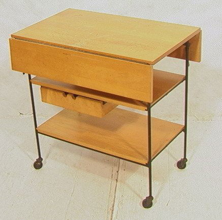 PAUL McCOBB Maple Iron Drop Leaf Cart. Rolling Ca: PAUL McCOBB Maple Iron Drop Leaf Cart. Rolling Cart with two shelves & one drawer. Not marked.-- Dimensions: H: 29 inches: W: 19.5 inches: D: 30 inches ---