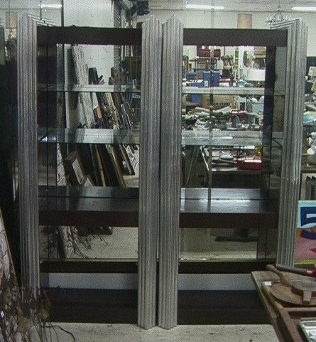 Pr 70's Modern Brown Laminate & Aluminum Etagere.: Pr 70's Modern Brown Laminate & Aluminum Etagere. Glass shelves with ribbed Aluminum fronts. -- Dimensions: H: 78 inches: W: 34 inches: D: 16.5 inches ---