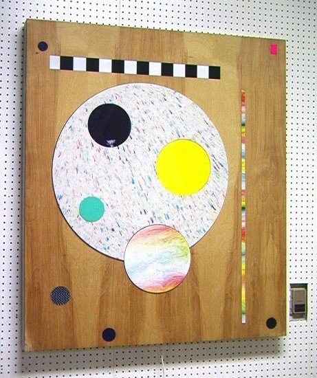 CORK MARCHESCHI Plywood Aluminum Wall Sculpture.: CORK MARCHESCHI Plywood Aluminum Wall Sculpture. Plywood case with Aluminum and colored Plexiglas inserts. Lights up and Plexiglas elements change color. Cork Marcheschi is a San Francisco native who