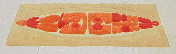 Sculpted Shag Carpet. Eskimo Totem Design Surfboa: Sculpted Shag Carpet. Eskimo Totem Design Surfboard Shaped Rug. Orange & Red on Cream Ground. Regal label.-- Dimensions: : D: 36 inches: L: 86 inches ---