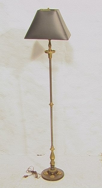 Regency style Stainless Steel Brass Floor Lamp. B: Regency style Stainless Steel Brass Floor Lamp. Brass Paw Feet on Metal Base. Decorator Black Shade with gold foil lining.-- Dimensions: H: 61.5 inches: W: 14.25 inches: D: 9.5 inches ---
