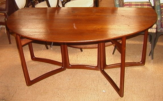 Peter Hvidt France and Sons Dining table. Drop s: Peter Hvidt France and Sons Dining table. Drop side gate leg. 20 inch drops.-- Dimensions: H: 28.5 inches: W: 64 inches: D: 17.5 inches --- US Shipping charge: $14