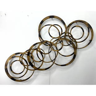 Large Marc Creates Wall Sculpture. Layered rings.: Large Marc Creates Wall Sculpture. Layered rings. Dimensions: Height: 42 inches, Width: 74 inches, Depth: 5 inches. --- - - We offer curbside delivery to NYC, Manhattan, Close Brooklyn, Hoboken about