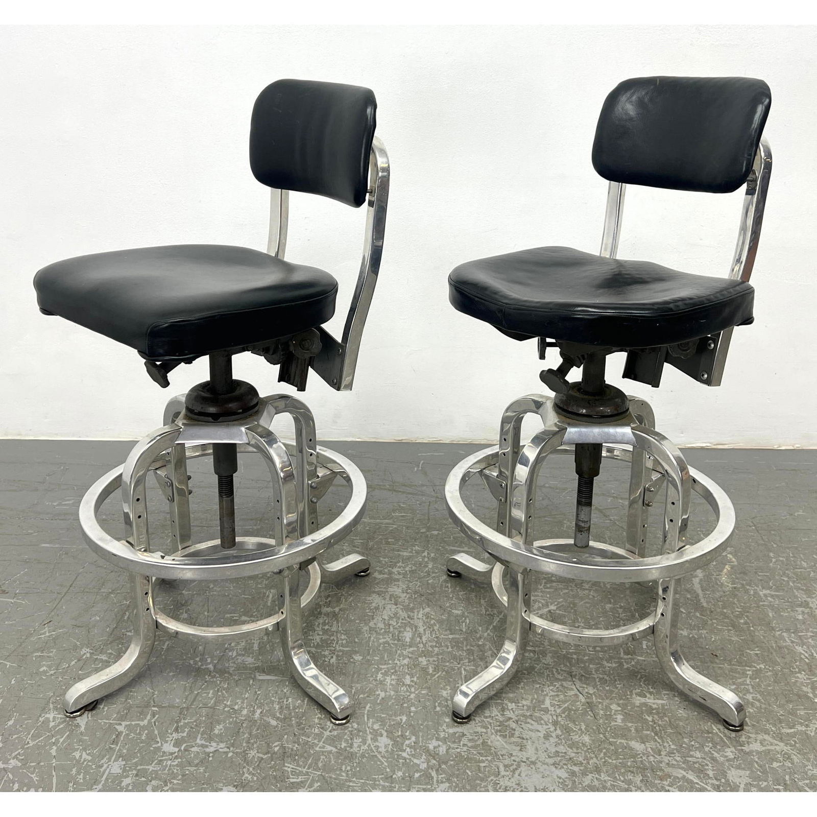 Pair Goodform Polished aluminum American swivel stools with leather upholstery (1 of 11)
