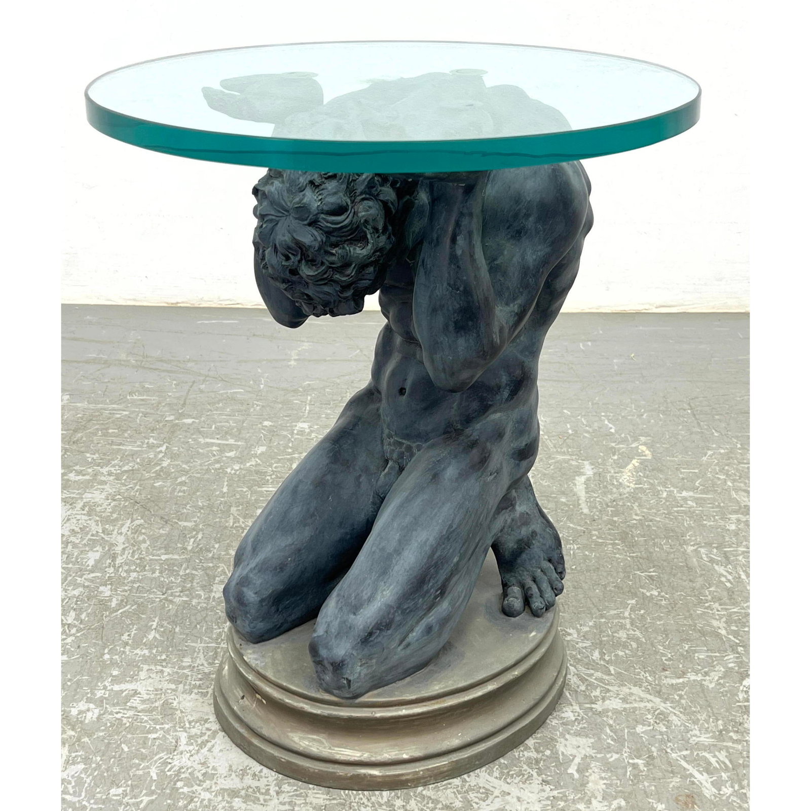 Composition Glass Top Side Drink Table. Greek Figure Base. Nude mall.: Composition Glass Top Side Drink Table. Greek Figure Base. Nude mall. Dimensions: Height: 21.5 inches, Width: 18 inches, Depth: 18 inches. --- - - We offer curbside delivery to NYC, Manhattan, Close B
