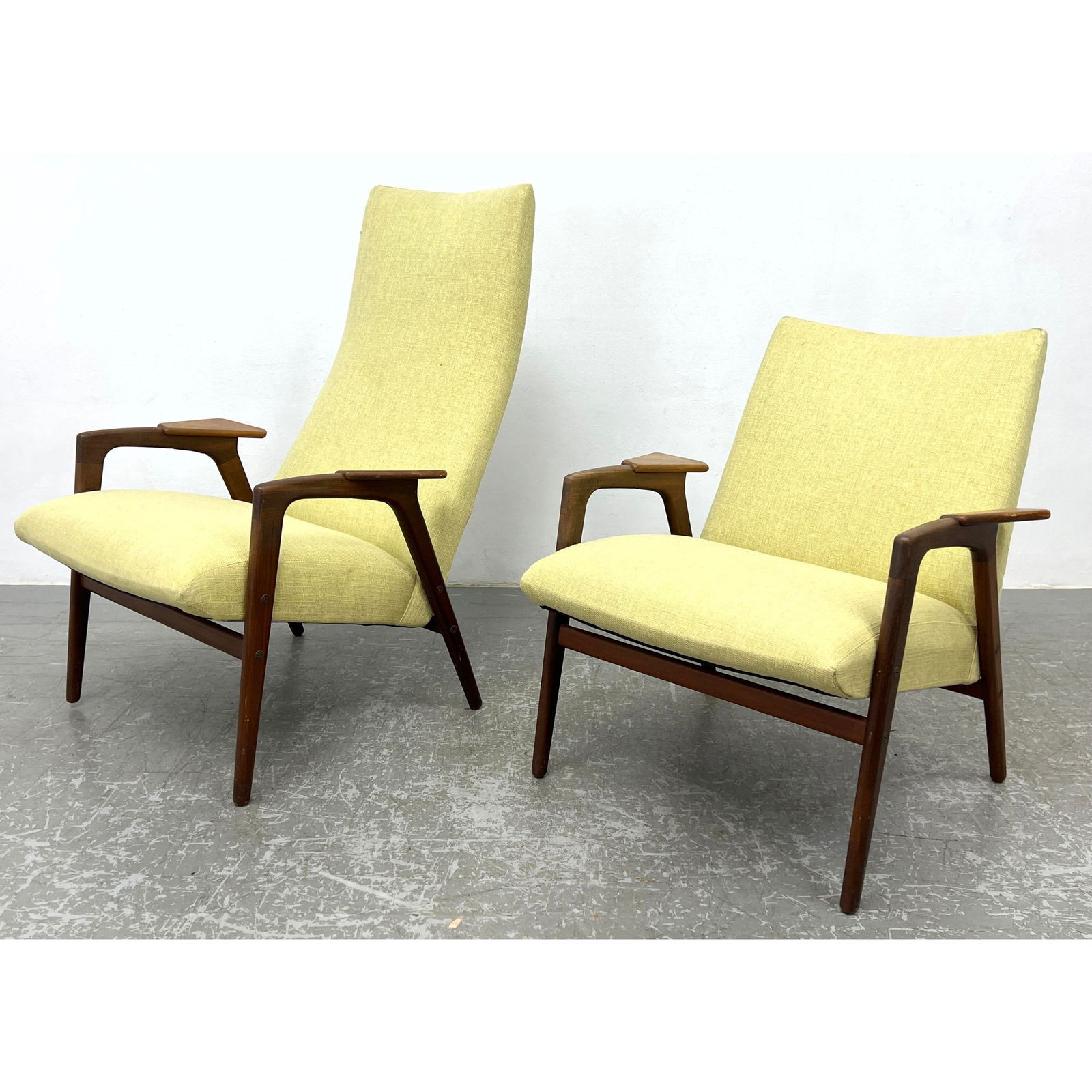 Pair Yngve Ekstrom lounge chairs. Ruster series. His and Hers. Tall and low Back.: Pair Yngve Ekstrom lounge chairs. Ruster series. His and Hers. Tall and low Back. Dimensions: Height: 38.5 inches, Width: 27.5 inches, Depth: 31 inches. - Seat Height: 17.5 inches - Additional Dimensi
