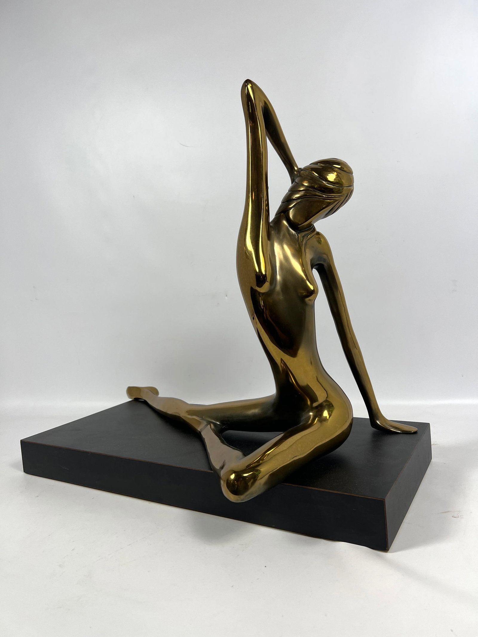 Bob Bennett 'Dawn' Brass Sculpture. Reclining Nude Edition 26/50. Separate Black Base. Signed on Foo: Bob Bennett 'Dawn' Brass Sculpture. Reclining Nude Edition 26/50. Separate Black Base. Signed on Foot. 1979. Dimensions: Height: 20 inches, Width: 12 inches, Depth: 22 inches. --- - - We offer curbsid
