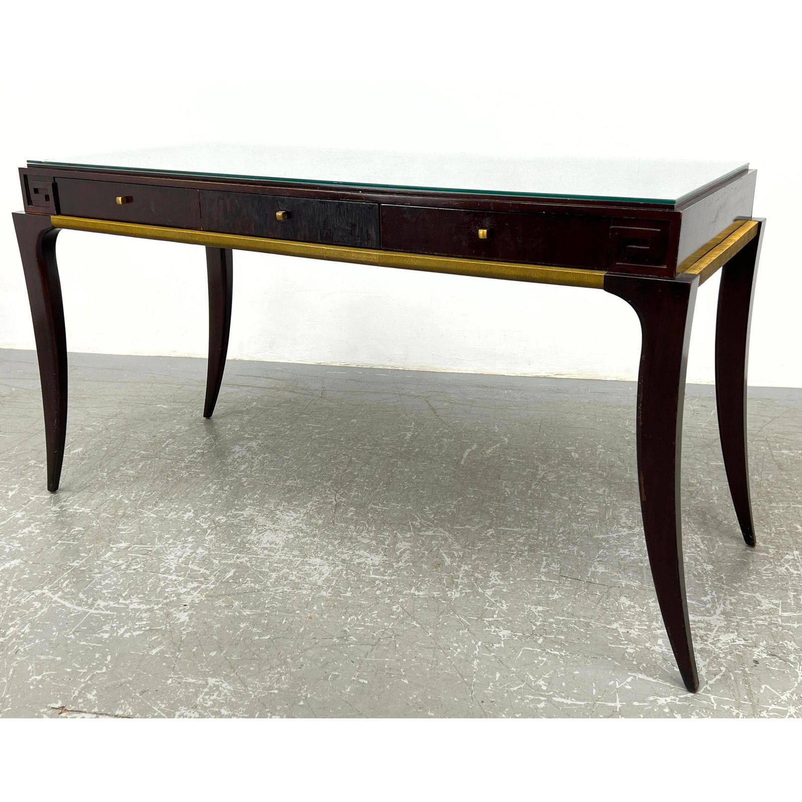 BAKER Rosewood Desk Table. THOMAS PHEASANT Collection. Elegant Saber Legs. Three Drawers. Two labels: BAKER Rosewood Desk Table. THOMAS PHEASANT Collection. Elegant Saber Legs. Three Drawers. Two labels. Dimensions: Height: 31 inches, Width: 51.5 inches, Depth: 23.25 inches. --- - - We offer curbside