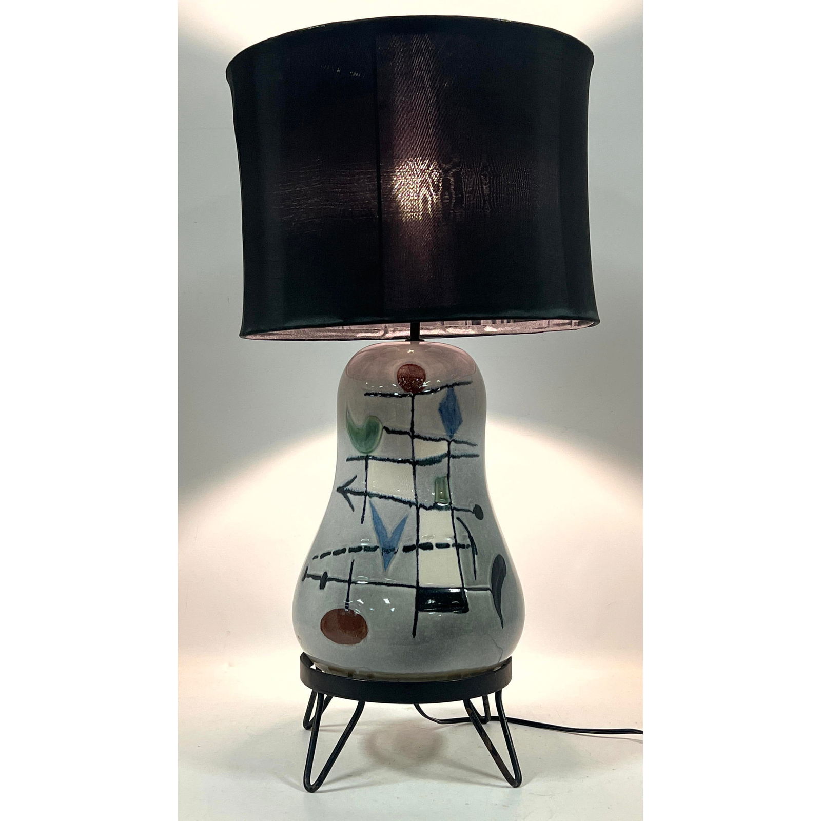 Glazed ceramic lamp with multicolored geometric abstract design. Wrought iron hairpin legs. (1 of 12)