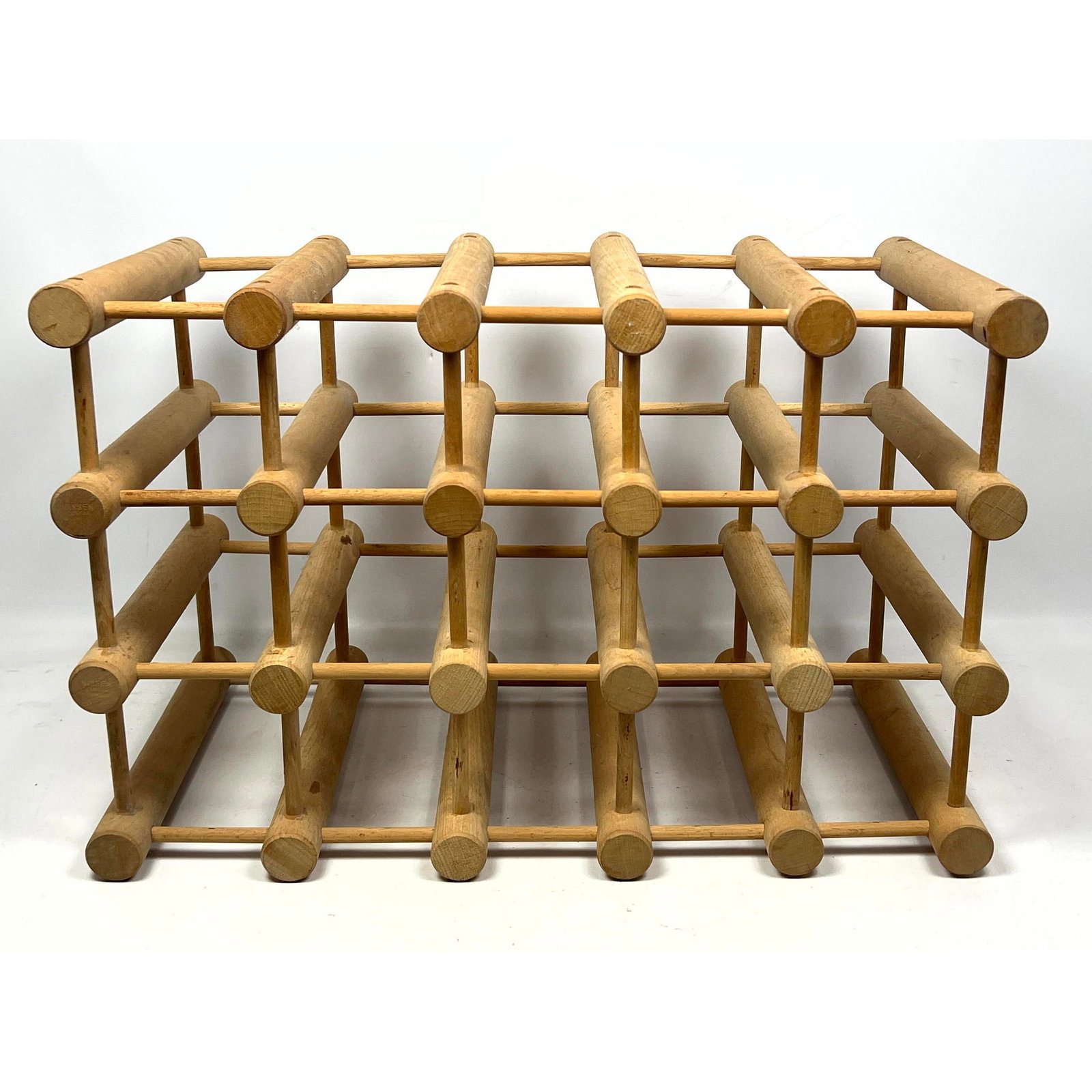 NISSEN Danish Modern Wine Rack. Peg and Dowel Construction. Marked.: NISSEN Danish Modern Wine Rack. Peg and Dowel Construction. Marked. Dimensions: Height: 14 inches, Width: 21.5 inches, Depth: 11 inches. --- - - We offer curbside delivery for most items to NYC, Manha
