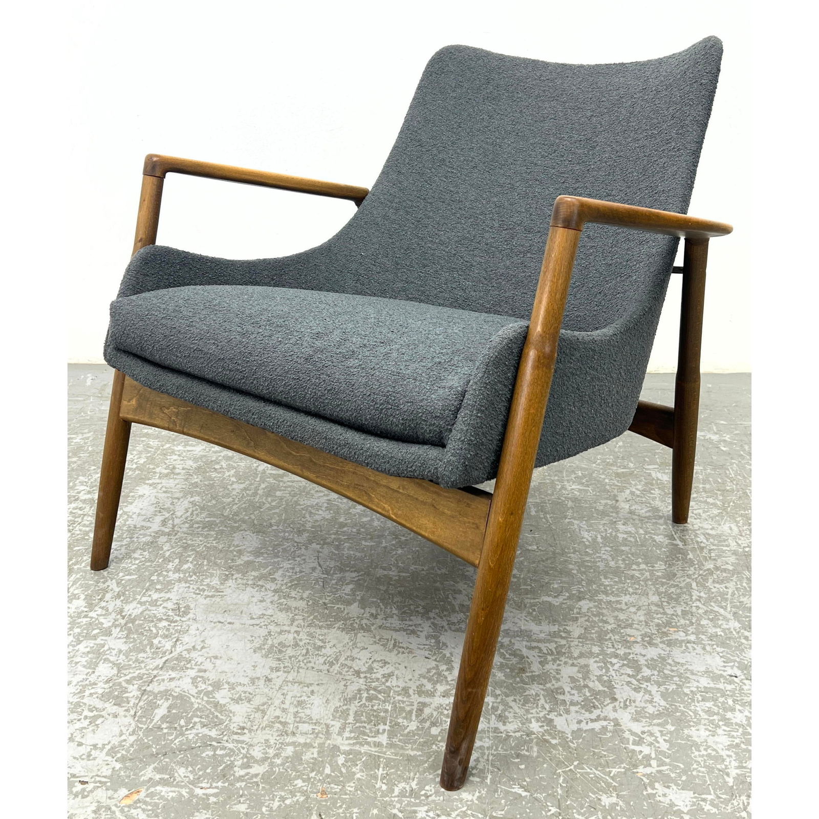 KOFOD LARSEN for SELIG Danish Modern Lounge Chair. Open form arms with angles back legs. New upholst: KOFOD LARSEN for SELIG Danish Modern Lounge Chair. Open form arms with angles back legs. New upholstery. Selig tag. Dimensions: Height: 27.5 inches, Width: 31.25 inches, Depth: 27 inches. - Seat Heigh