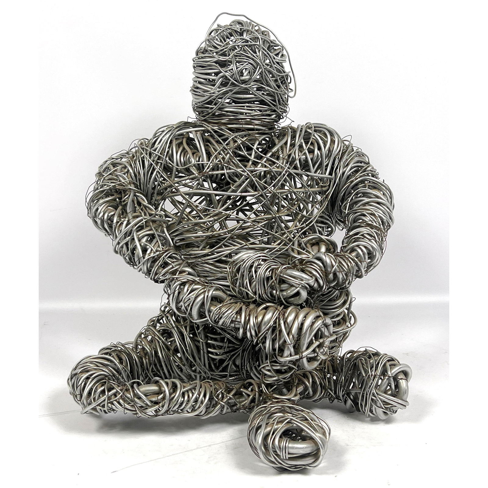 Aluminum wire Figural sculpture. Seated Figure (1 of 9)