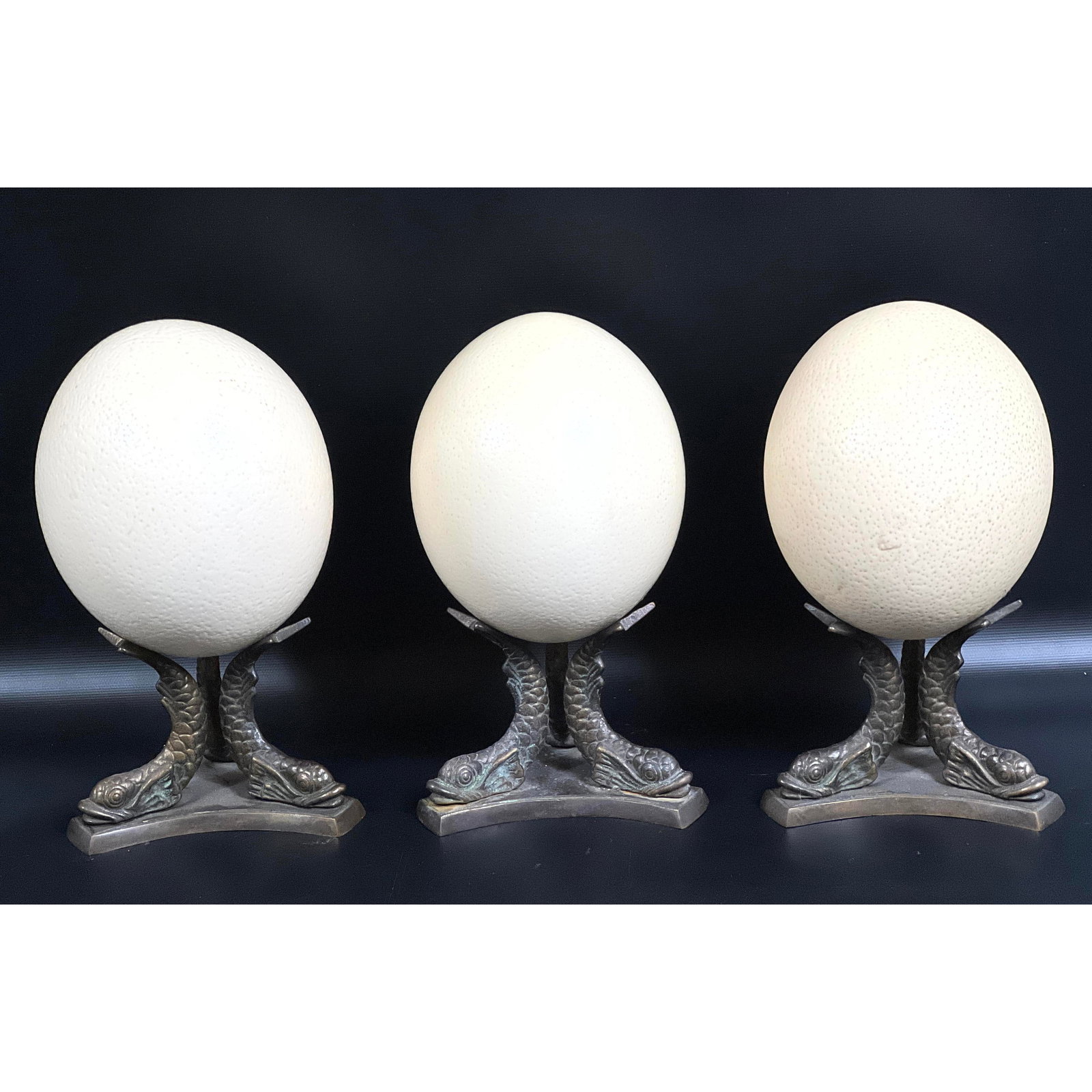 3 Natural Ostrich Eggs on Metal Dolphin form Bases. Hollowed eggs. (1 of 10)