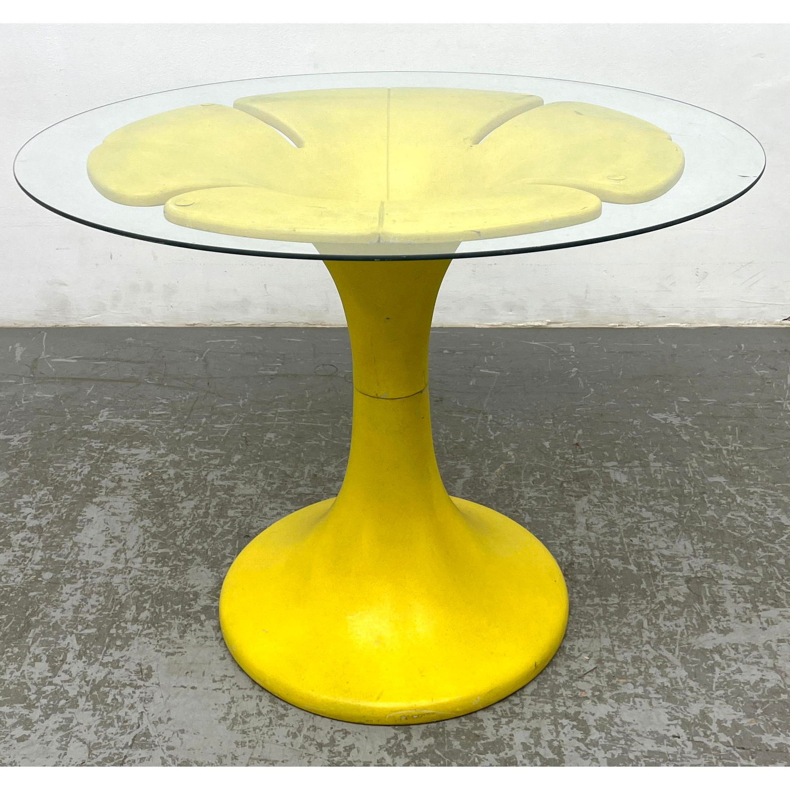 Molded Yellow Plastic Floral Base Cafe Table. Modernist. Small round glass top. (1 of 8)