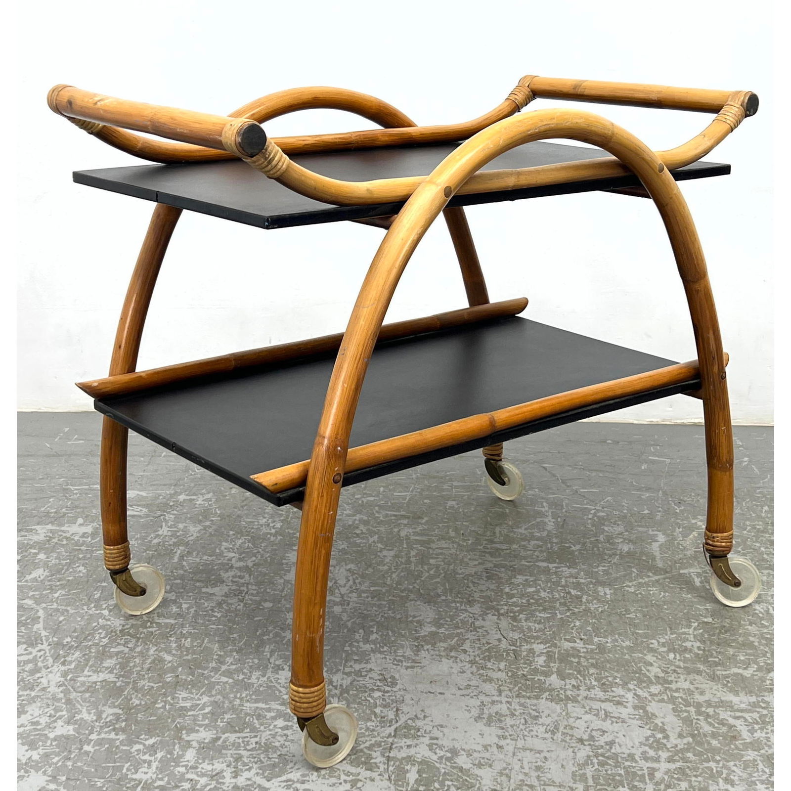 Vintage Modernist Bamboo two tiered cart. Rolling Serving Bar Cart. Two black laminate levels. (1 of 14)