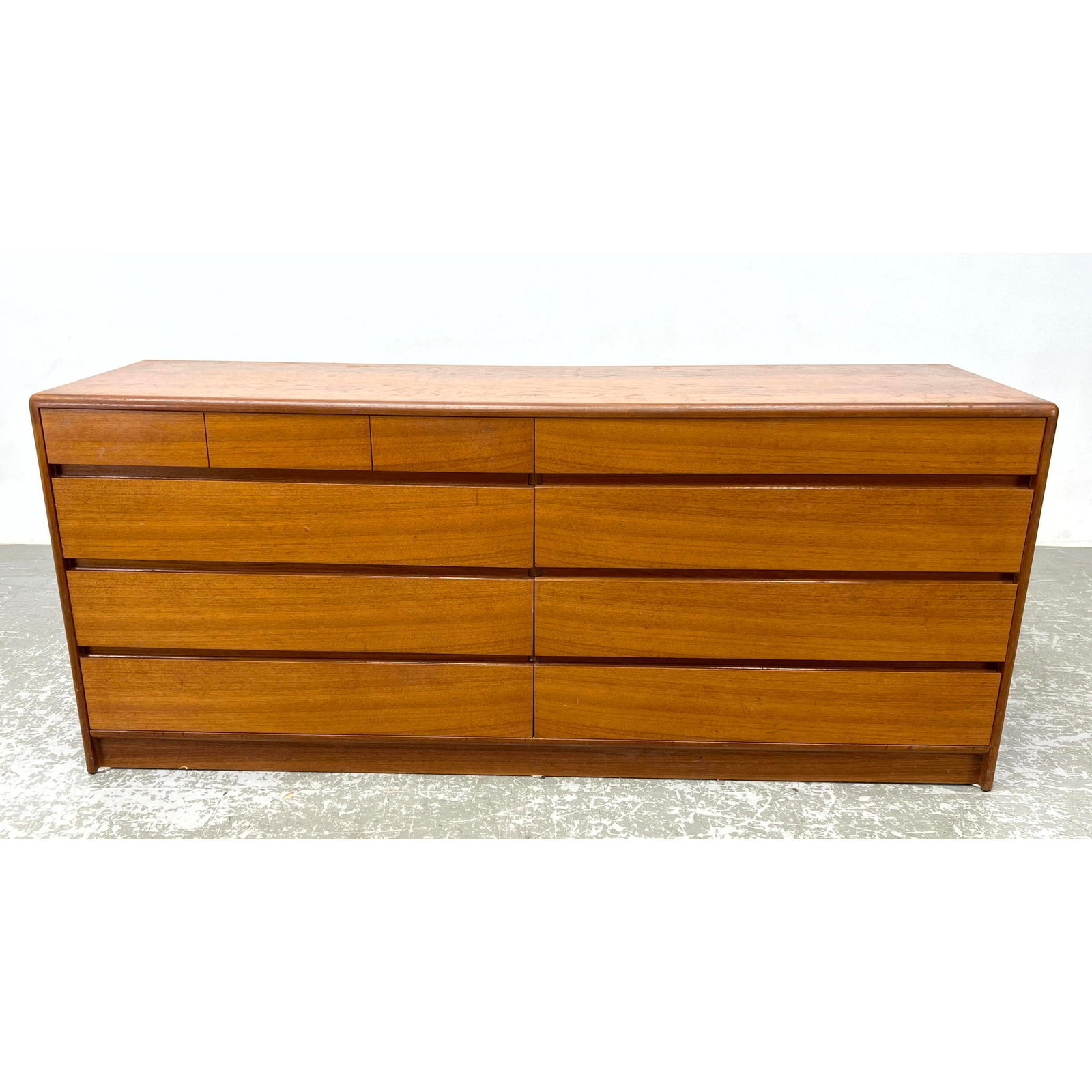 NORDISK ANDELS-EKSPORT Danish Modern Teak Dresser. Label.: NORDISK ANDELS-EKSPORT Danish Modern Teak Dresser. Label. Dimensions: Height: 29 inches, Width: 69 inches, Depth: 18 inches. ---