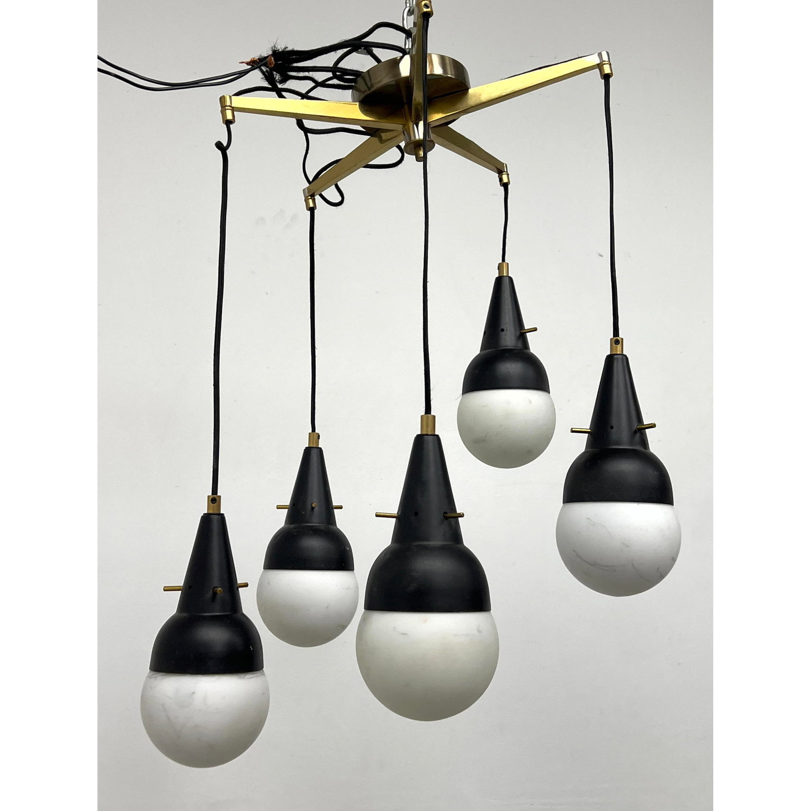 Italian chandelier with 5 inch diameter glass ball shades. brass with Black Shade Caps (1 of 10)