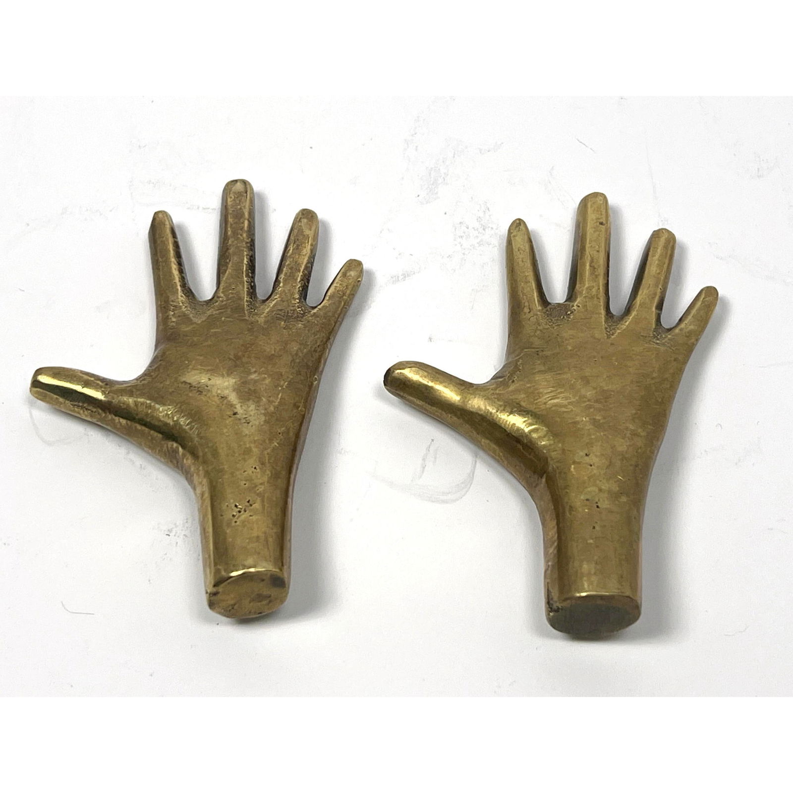 2pc After Aubock Bronze hands. Newer production. Crude cast.: 2pc After Aubock Bronze hands. Newer production. Crude cast. Dimensions: Height: 3.25 inches, Width: 2.25 inches, Depth: .5 inches. --- US Packing and Shipping charge: $20 Plus insurance at a rate of