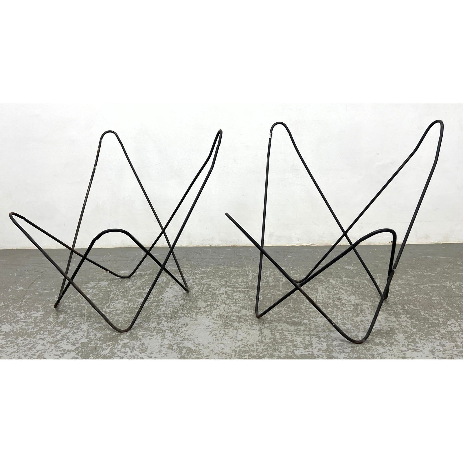 Pr Iron Butterfly Lounge Chair Frames. Mid Century design. Metal frames only; no Fabric slings.: Pr Iron Butterfly Lounge Chair Frames. Mid Century design. Metal frames only; no Fabric slings. Dimensions: Height: 35 inches, Width: 32.5 inches, Depth: 29 inches. ---