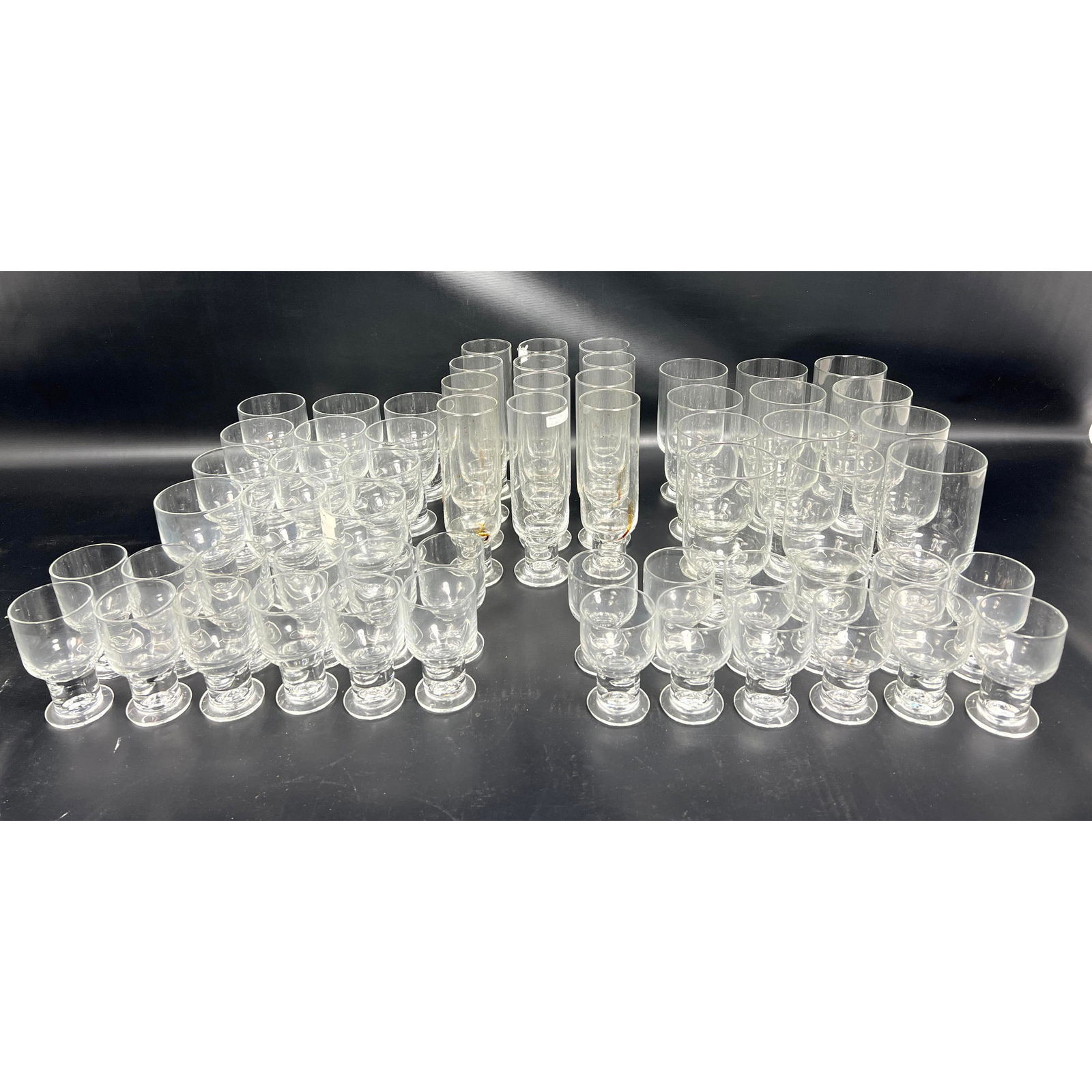 59 piece. Arabia Glass Stemware. designed by Heikki Orvola. Service for 12 in 4 several sizes; missi: 59 piece. Arabia Glass Stemware. designed by Heikki Orvola. Service for 12 in 4 several sizes; missing one glass Dimensions: Height: 9 inches, Width: inches. ---