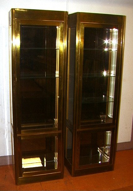 PR Tall MASTERCRAFT Brass Display Cabinets Etager: PR Tall MASTERCRAFT Brass Display Cabinets Etageres. Smoky Mirror Back. Tall narrow form. Electrified. Upper and lower doors. Glass shelves.-- Dimensions: H: 86.25 inches: W: 26 inches: D: 15 inches -