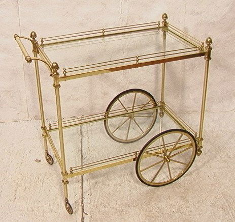 Regency style Brass and Glass Bar Tea Cart. Two t: Regency style Brass and Glass Bar Tea Cart. Two tier cart with double brass rod gallery and pine cone finials.-- Dimensions: H: 33.5 inches: W: 37 inches: D: 20 inches ---