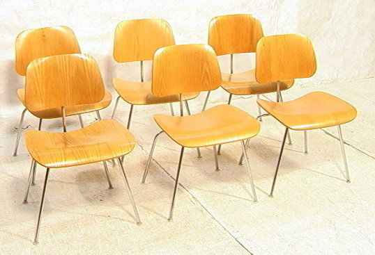 Set 6 CHARLES EAMES DCM Dining Chairs. Eight HERM: Set 6 CHARLES EAMES DCM Dining Chairs. Eight HERMAN MILLER Chairs with blond seat and back on chrome metal legs. Marked.-- Dimensions: H: 29.75 inches: W: 19.5 inches: D: 22 inches ---