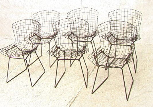 Six Harry BERTOIA Wire Chairs on Black Metal Fram: Six Harry BERTOIA Wire Chairs on Black Metal Frame. -- Dimensions: H: 30.5 inches: W: 21.25 inches: D: 25 inches ---