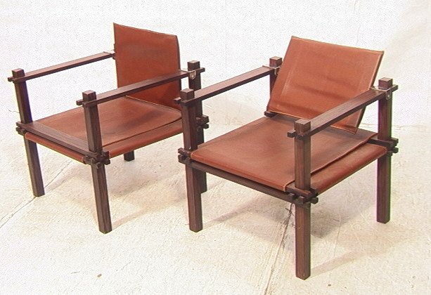 PR Safari Style Chairs. Brown Leather Sling Seat: PR Safari Style Chairs. Brown Leather Sling Seat on dark wood frame. -- Dimensions: H: 28.5 inches: W: 24.25 inches: D: 25.5 inches ---